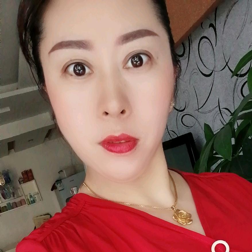 罗