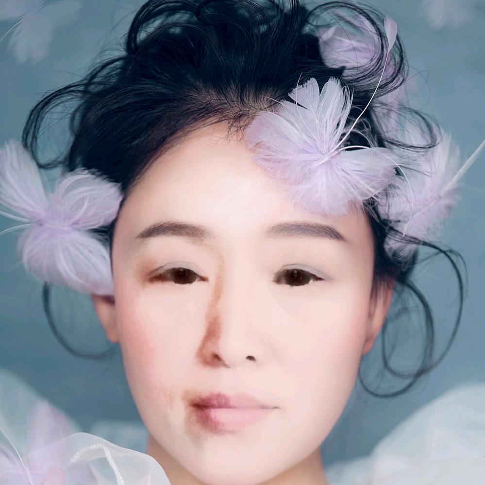 李华