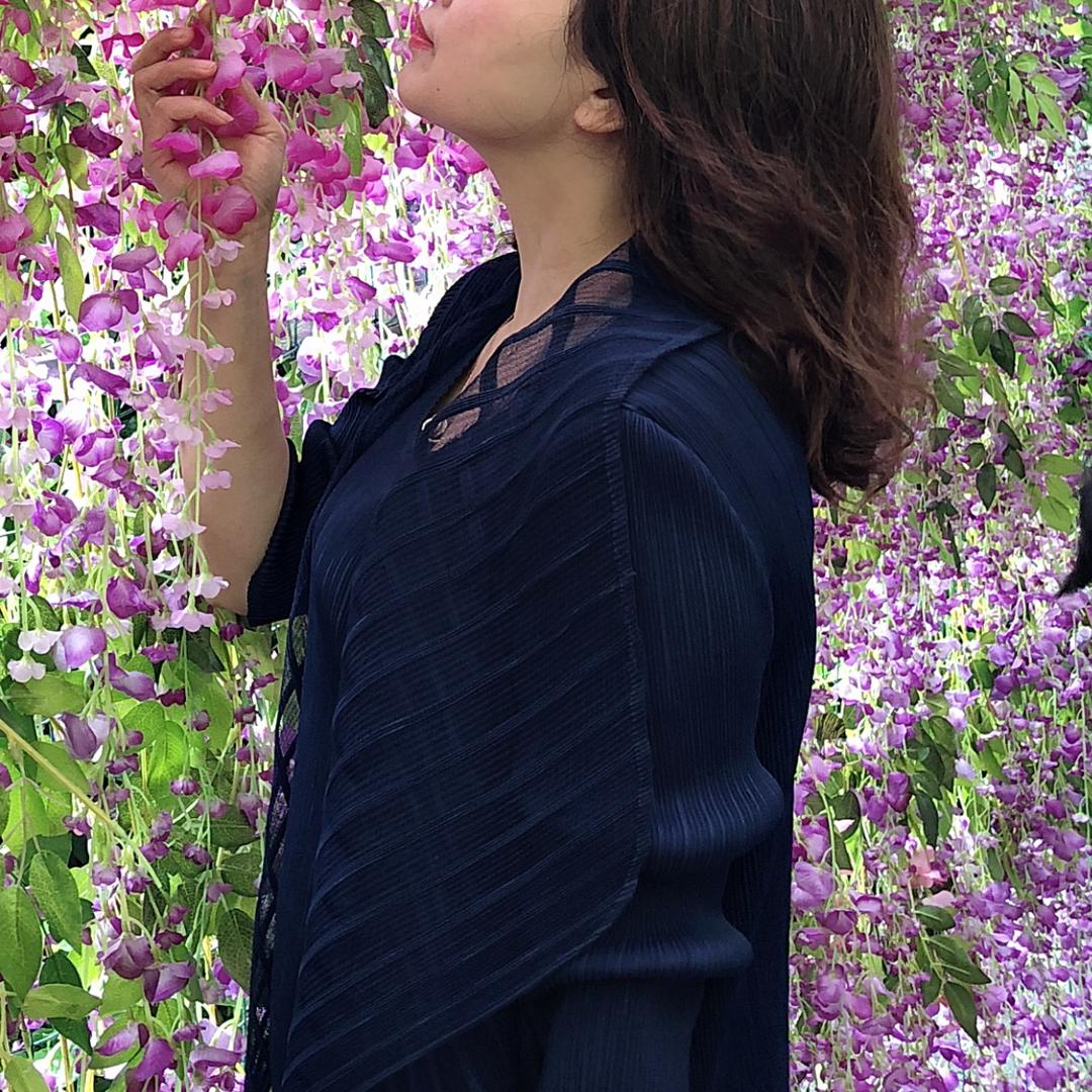 嫣然