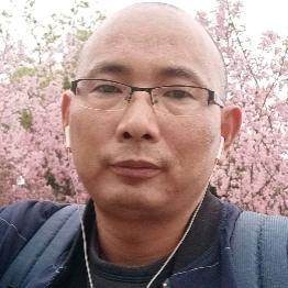 束永权.