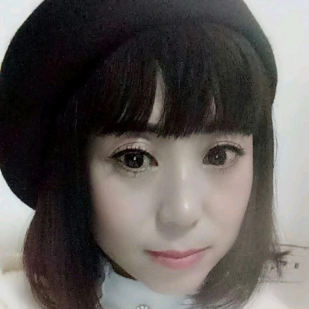 嫣然一笑