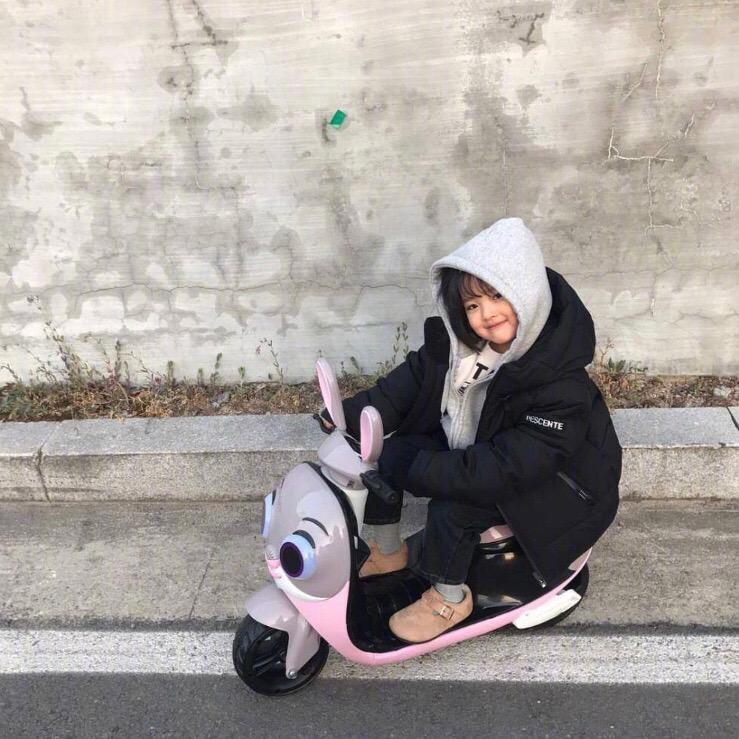 七七