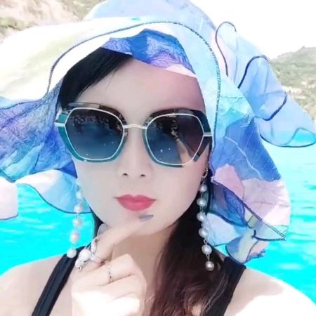 淡定爱笑的娟子