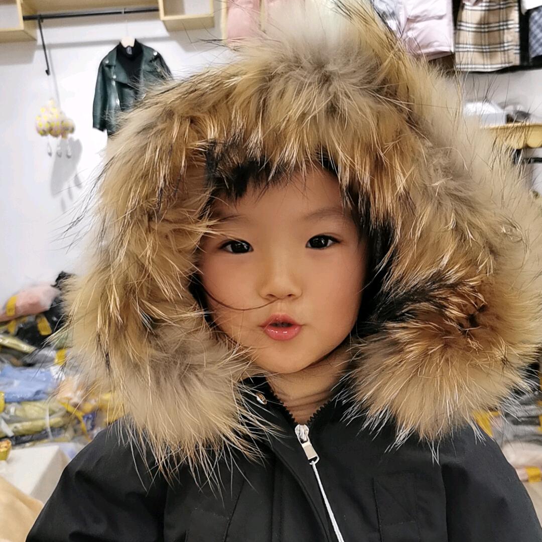 郸城县商贸城南门可乐家童装.