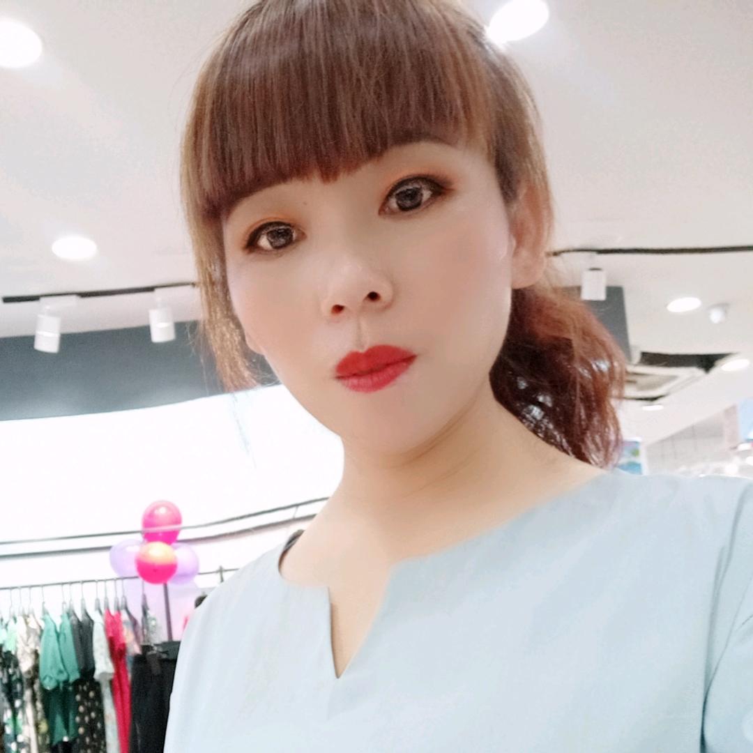 天成李霞