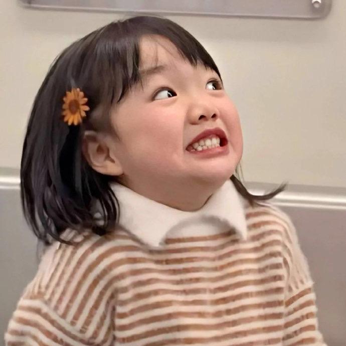 李香兰.