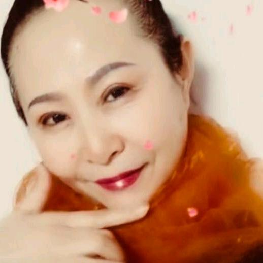 嫣然