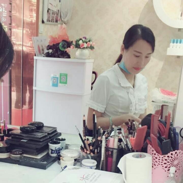 美美绣.周春菊