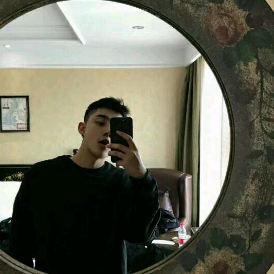 T.