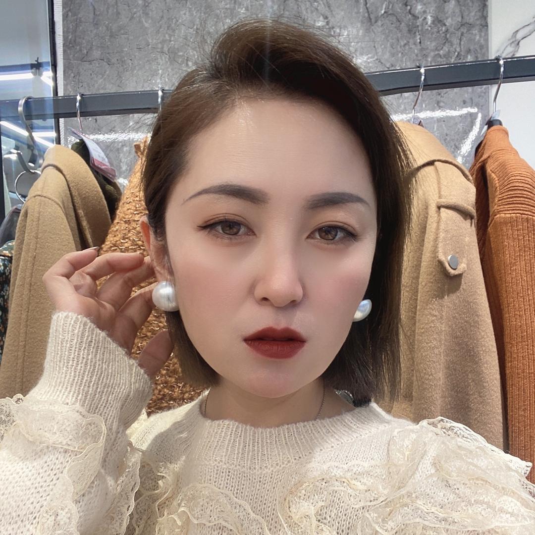 UZ女装 葛小姐