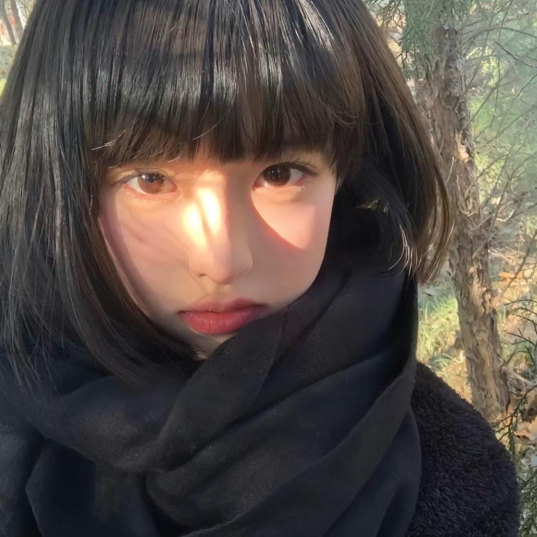 尘宜.
