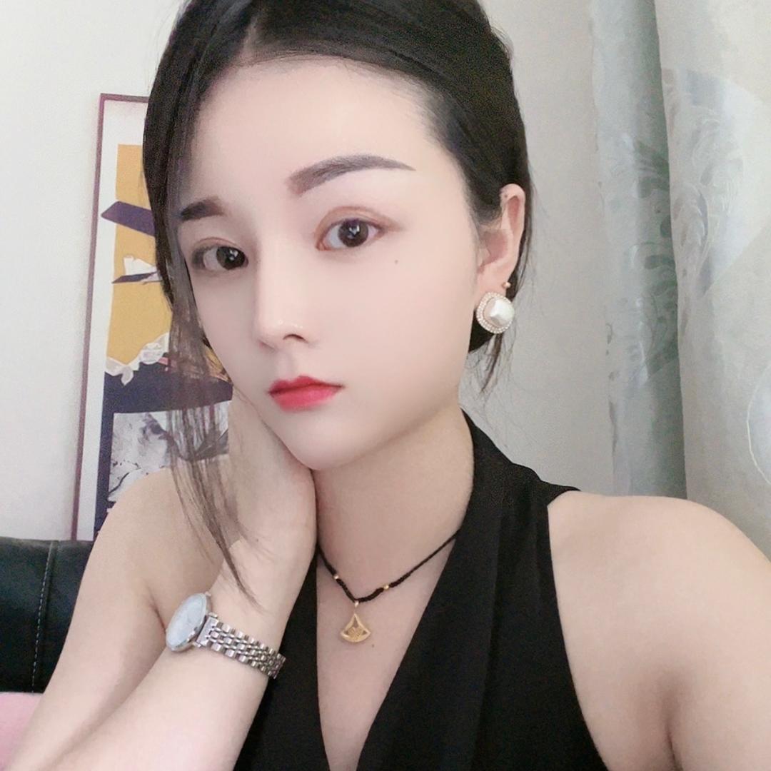 嫣然