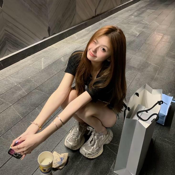 M.