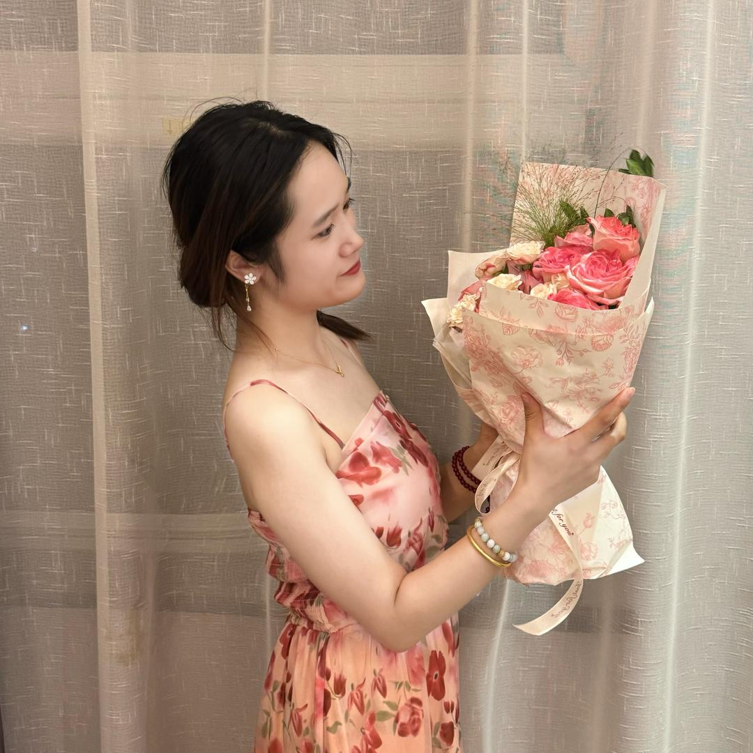妮 妮
