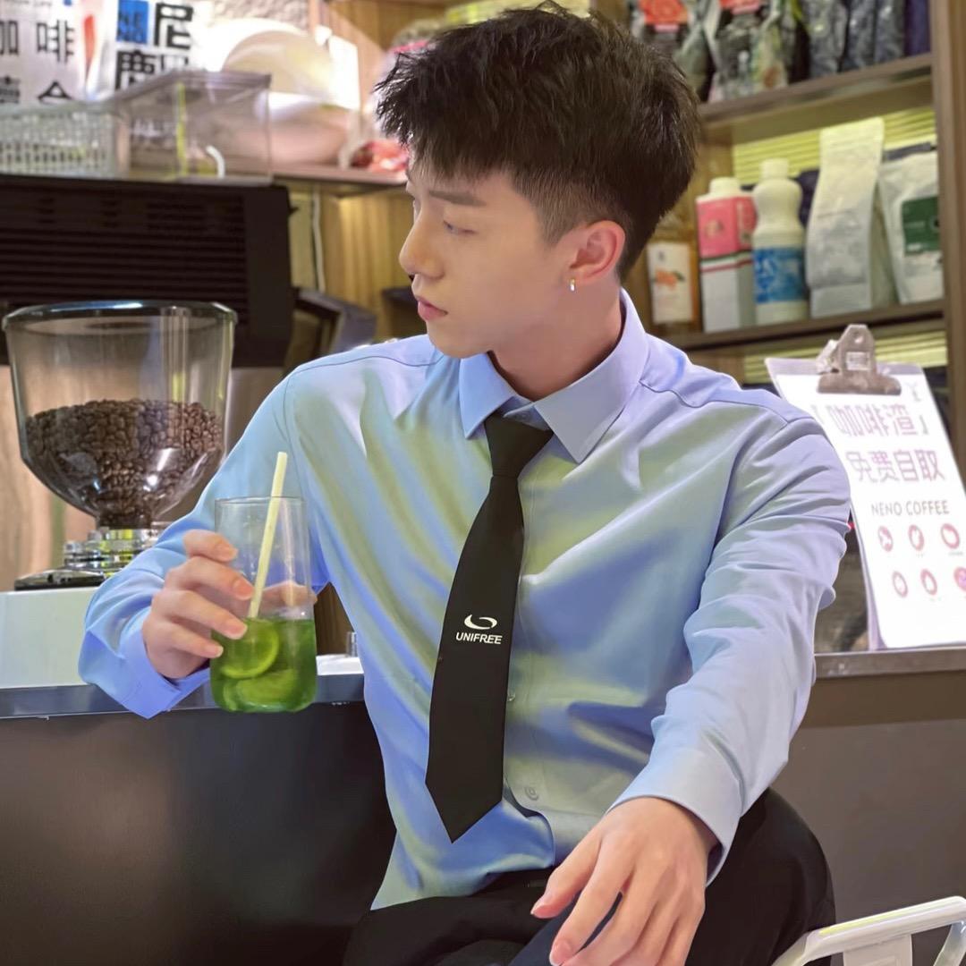 张不染