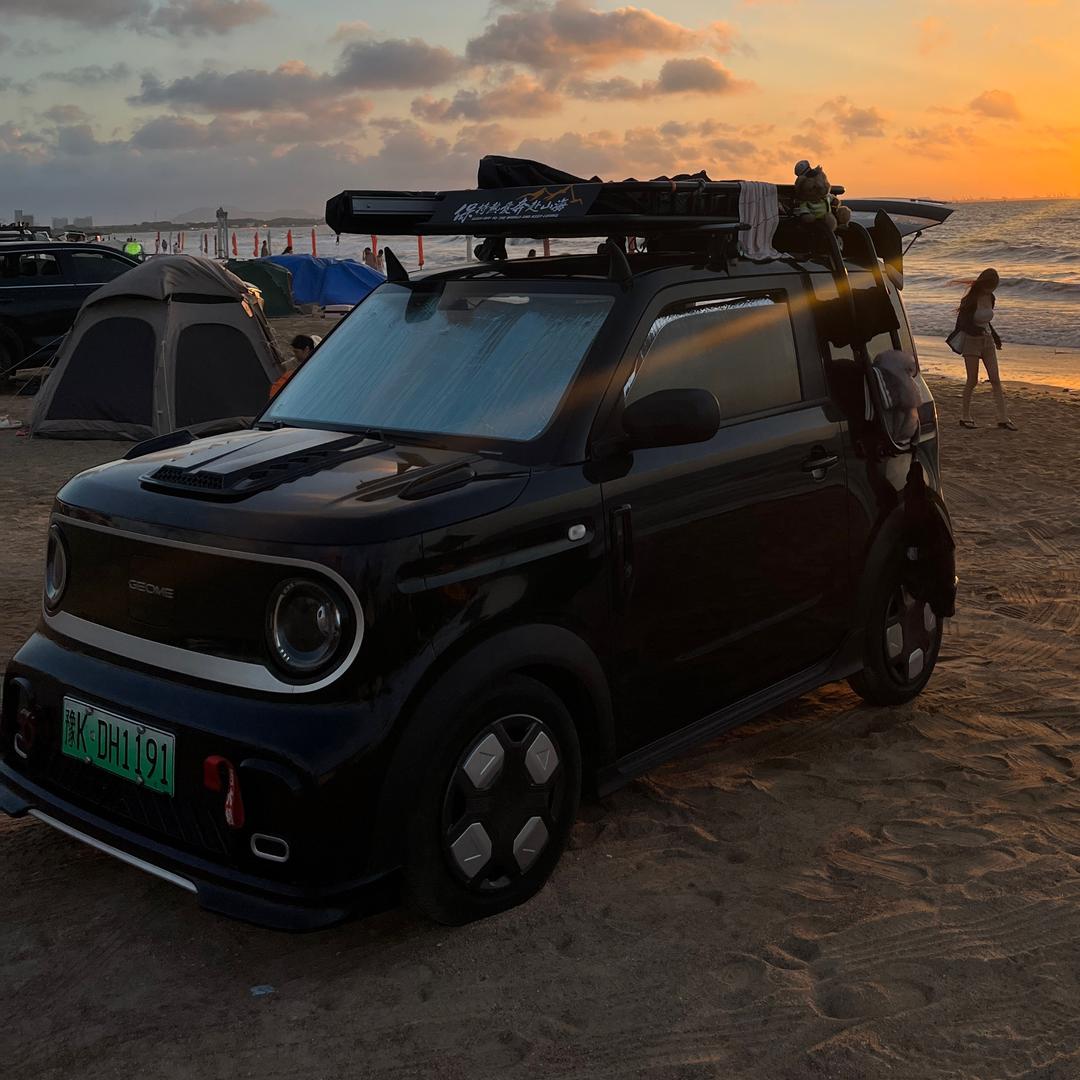 开熊猫mini的麦兜