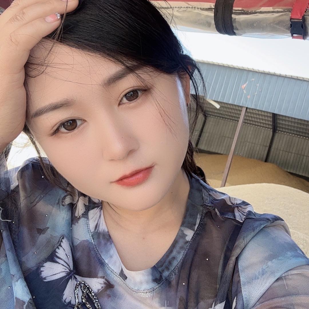 米伟《收粮的90后》