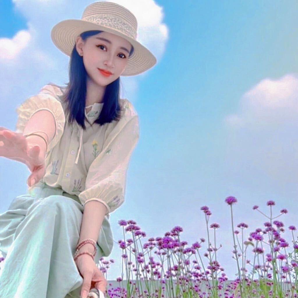 何姿~
