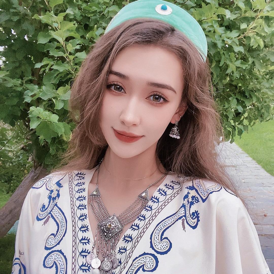 夏高冷娜·