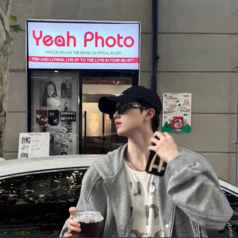 B Y