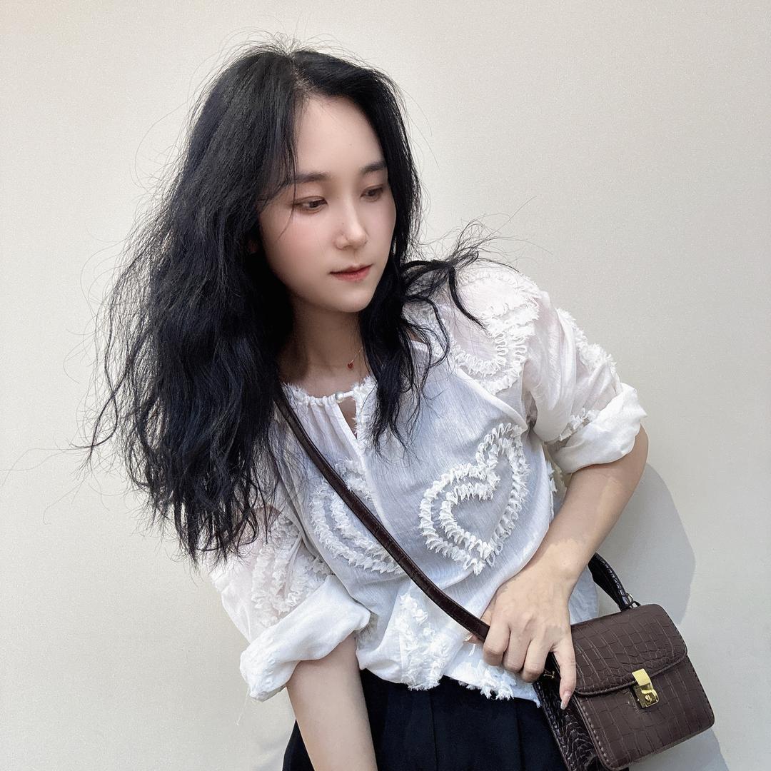 采衣·云落伊里（主理人）