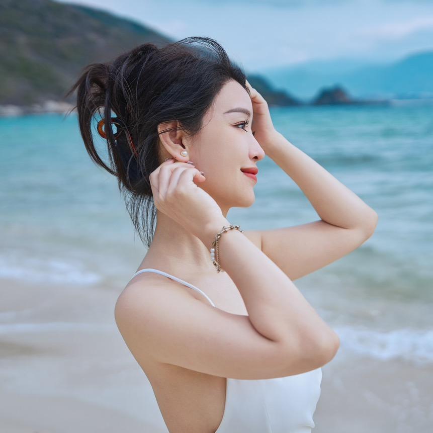七七～
