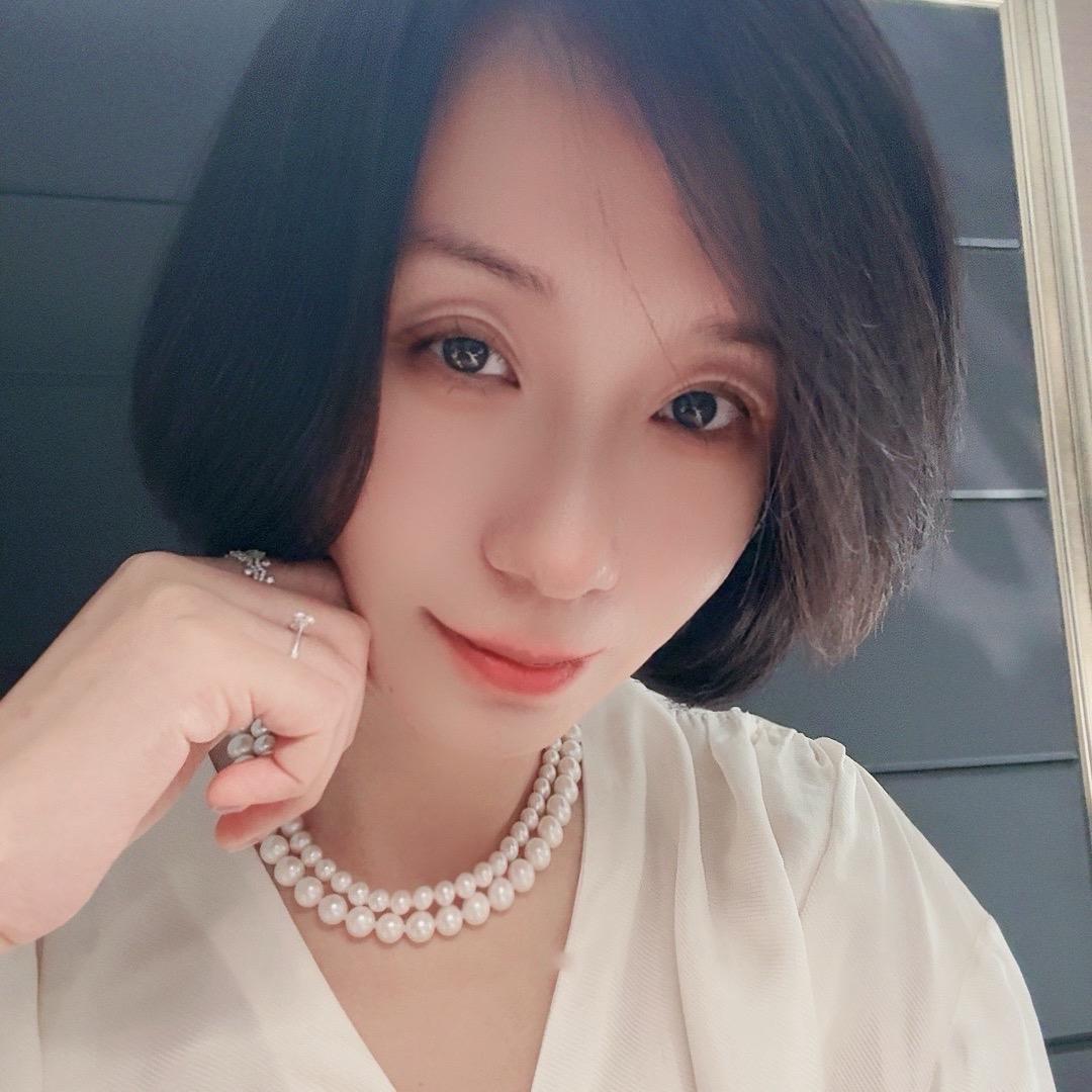 娜时