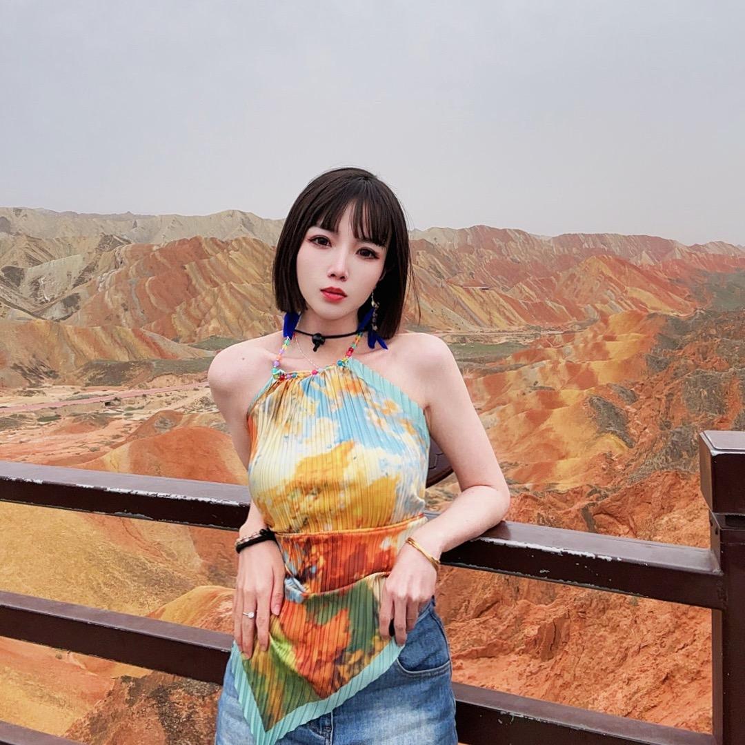 张小愛…