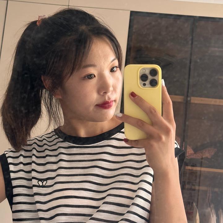 白秋梅.