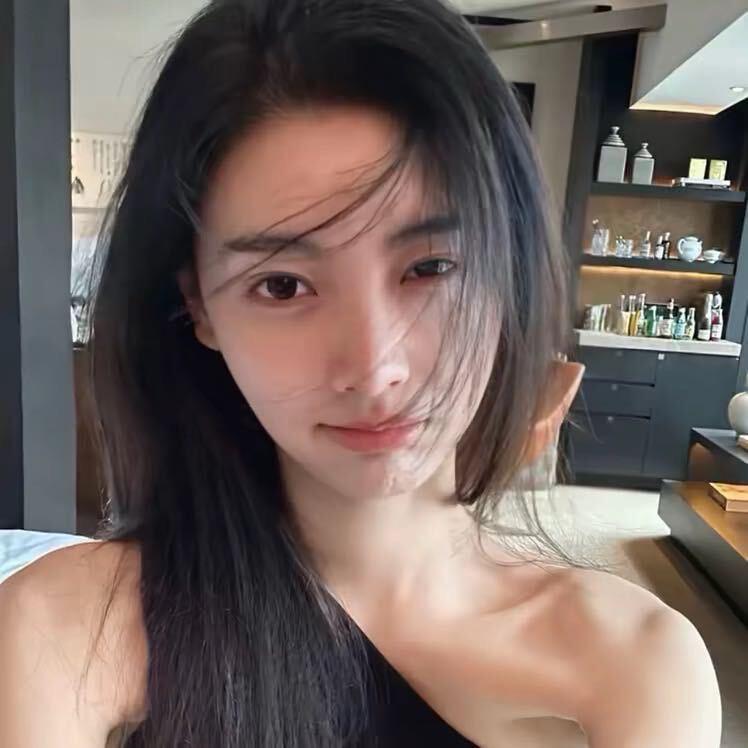 張..