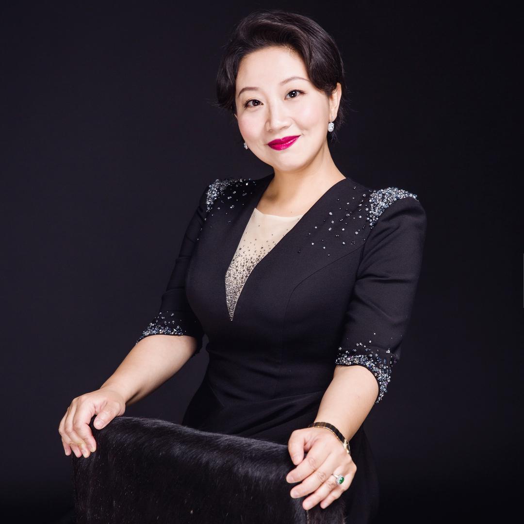 教了二十多年钢琴的靳哲老师