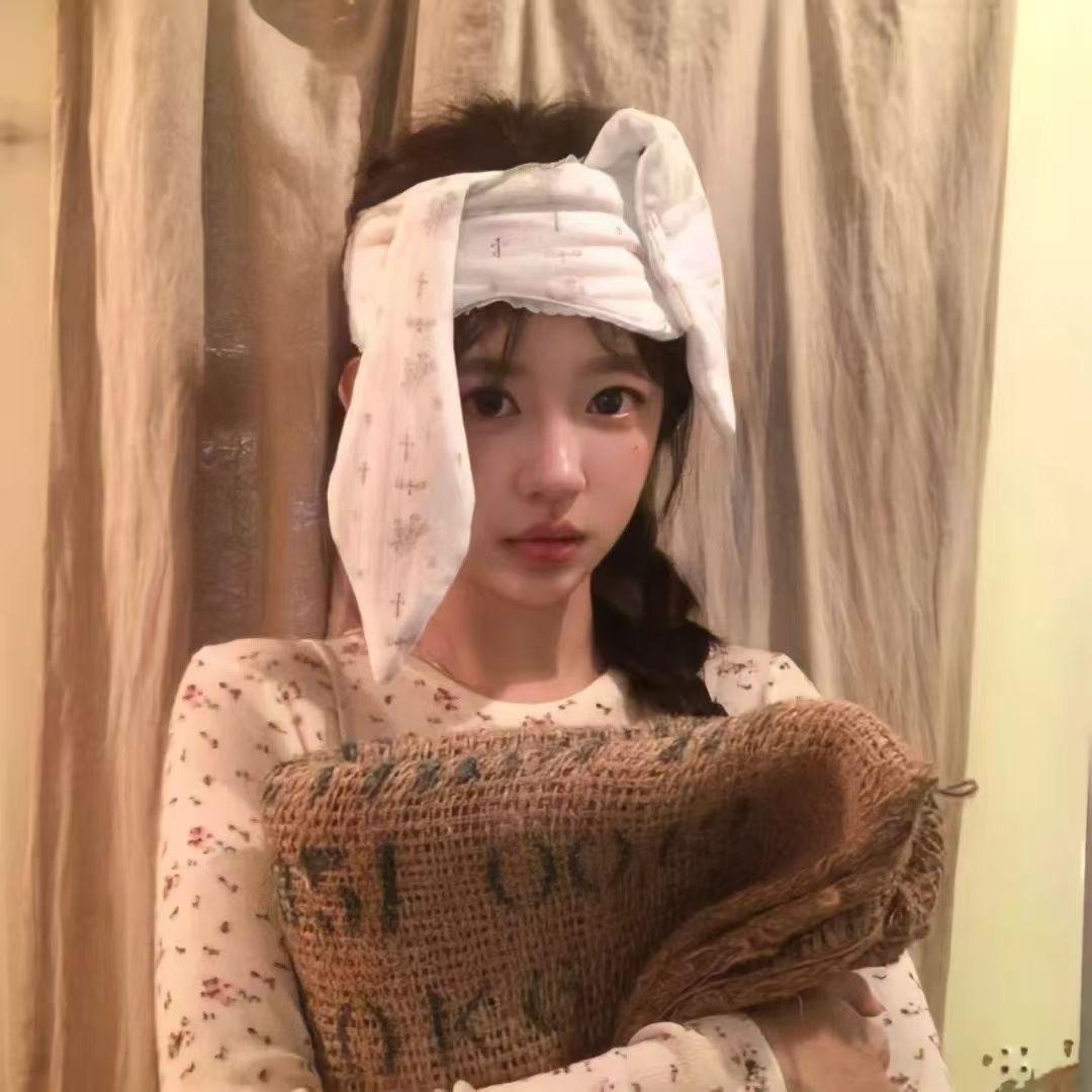 七七