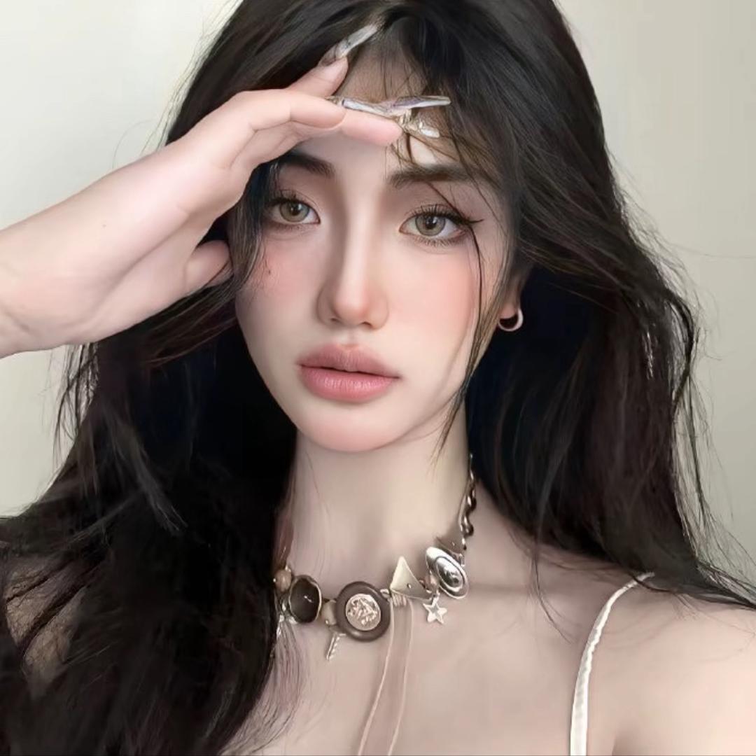 T.
