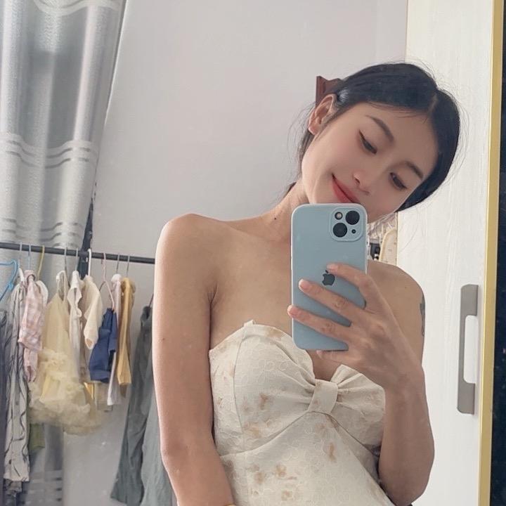 娜.