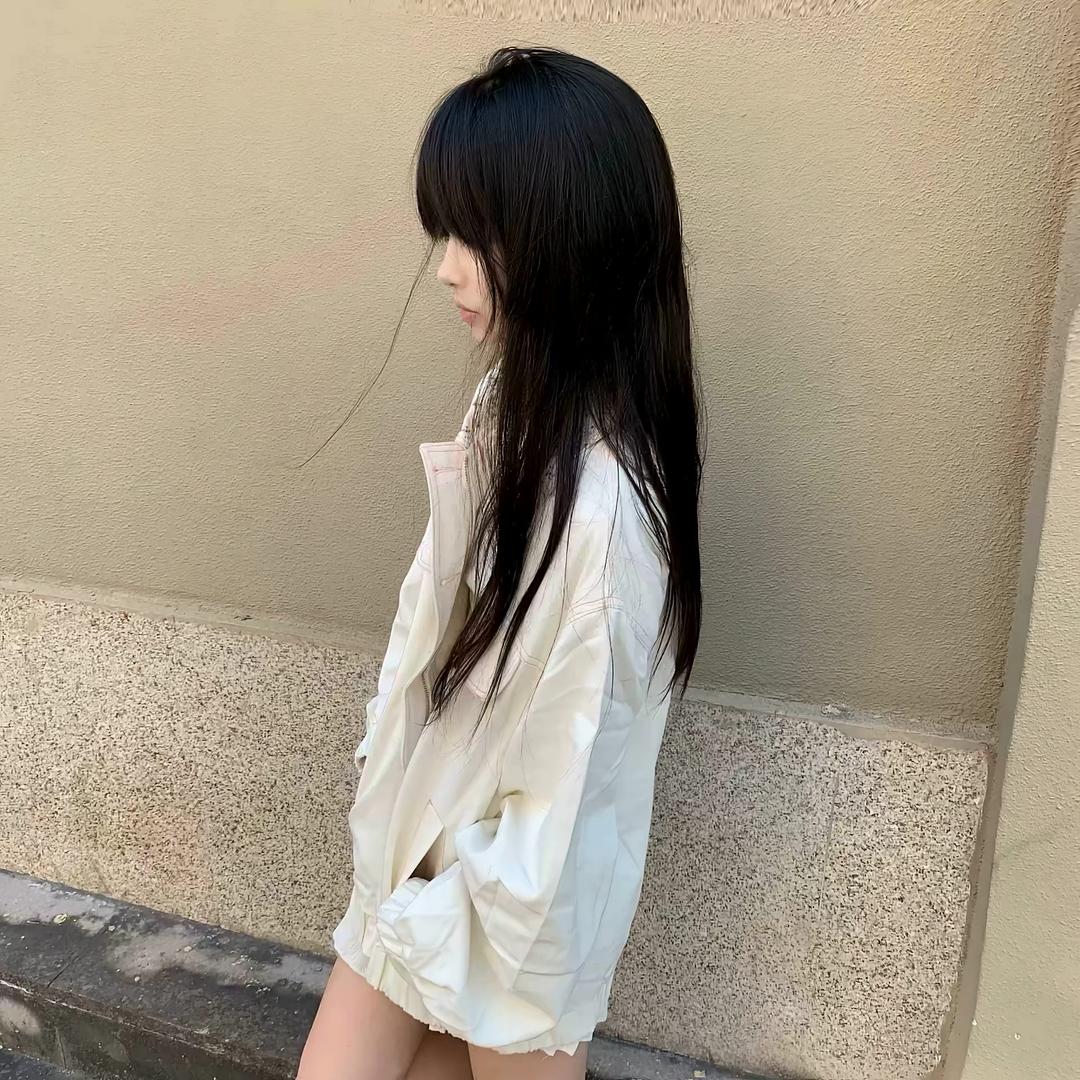 七七