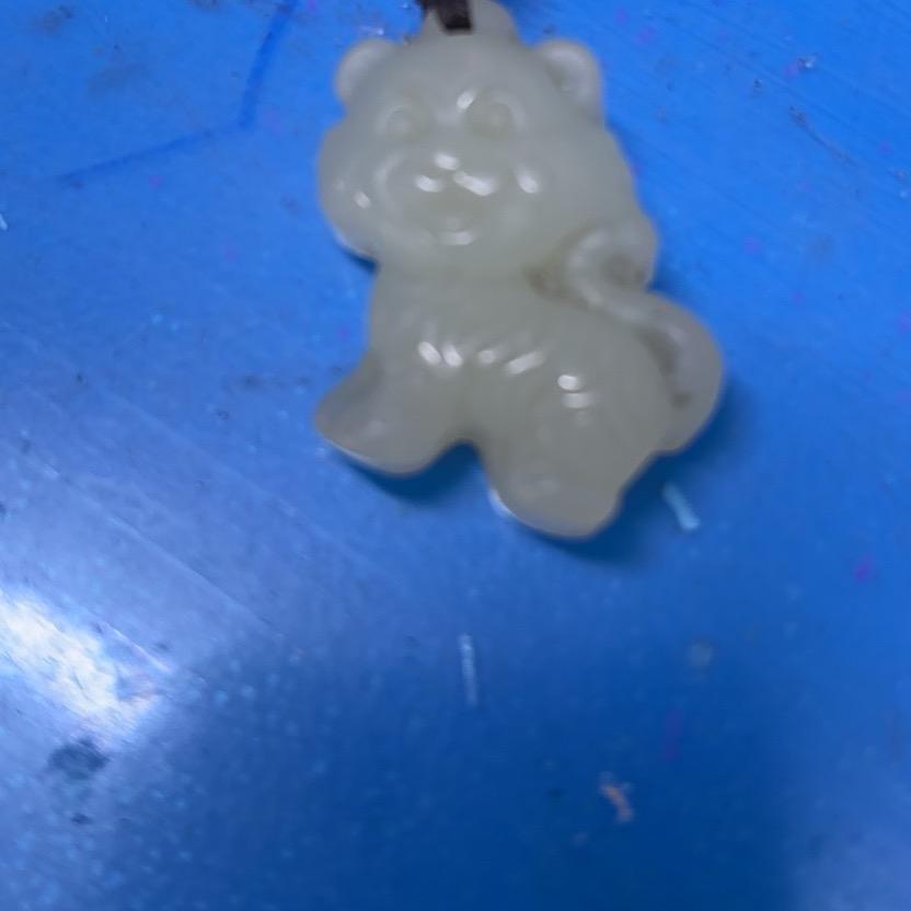 ‰