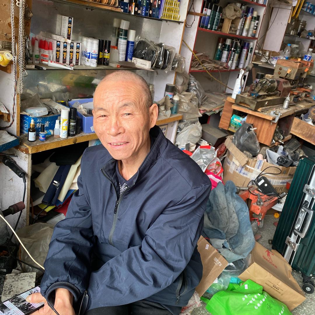 修鞋师傅周国胜