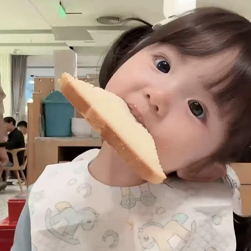乖^