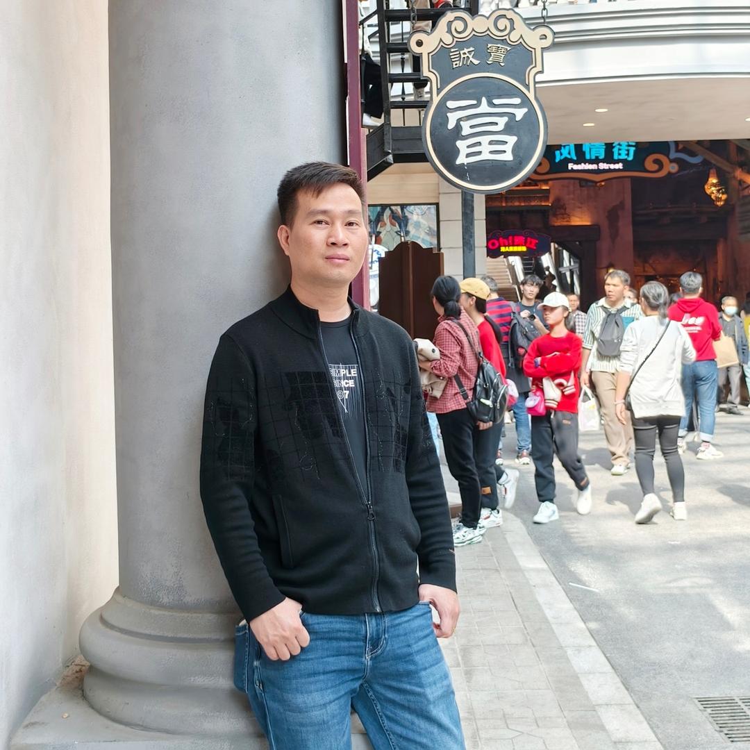 美宜佳•程