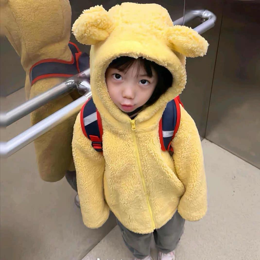 不是他