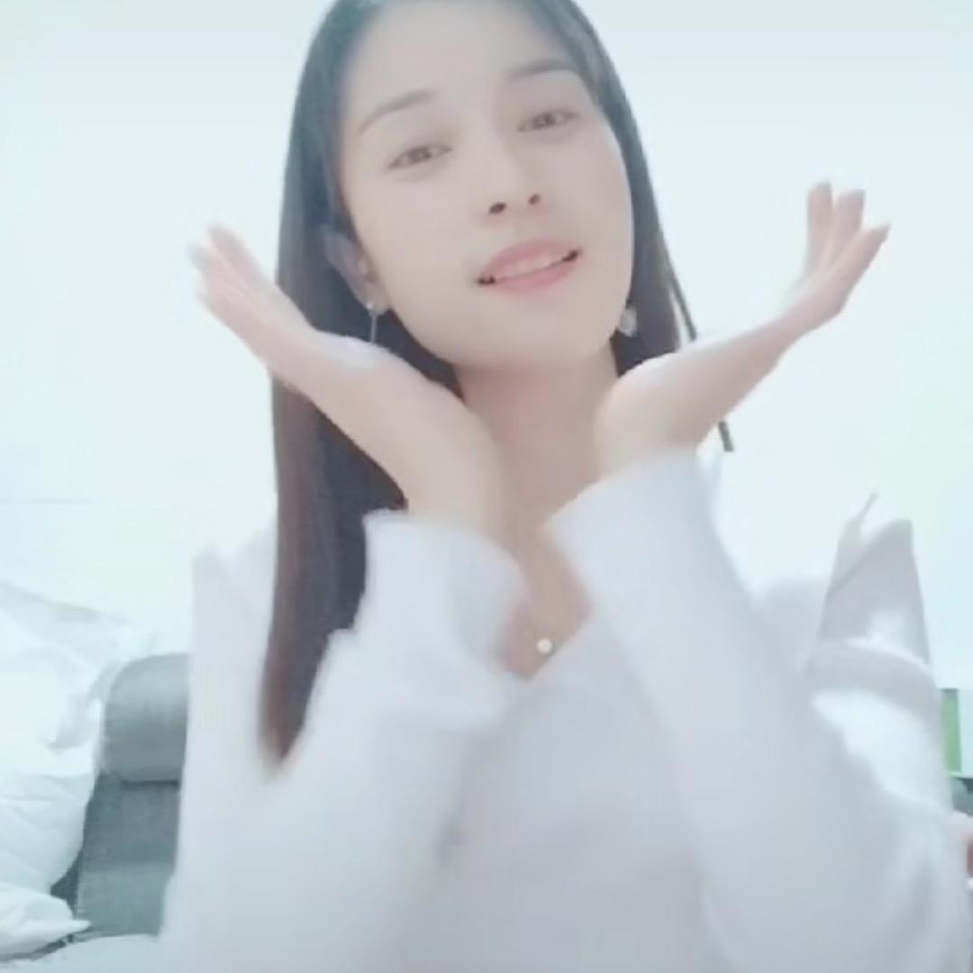 七七