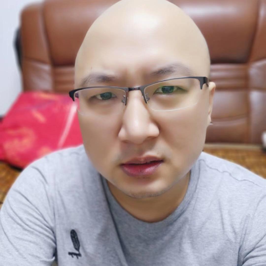 光头老何
