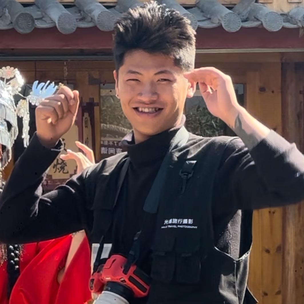 爱摄影的小公鸡