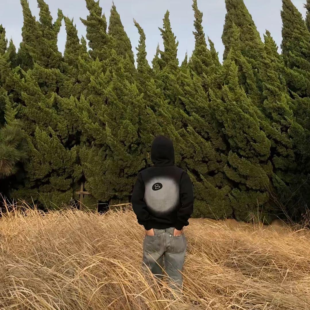 J.