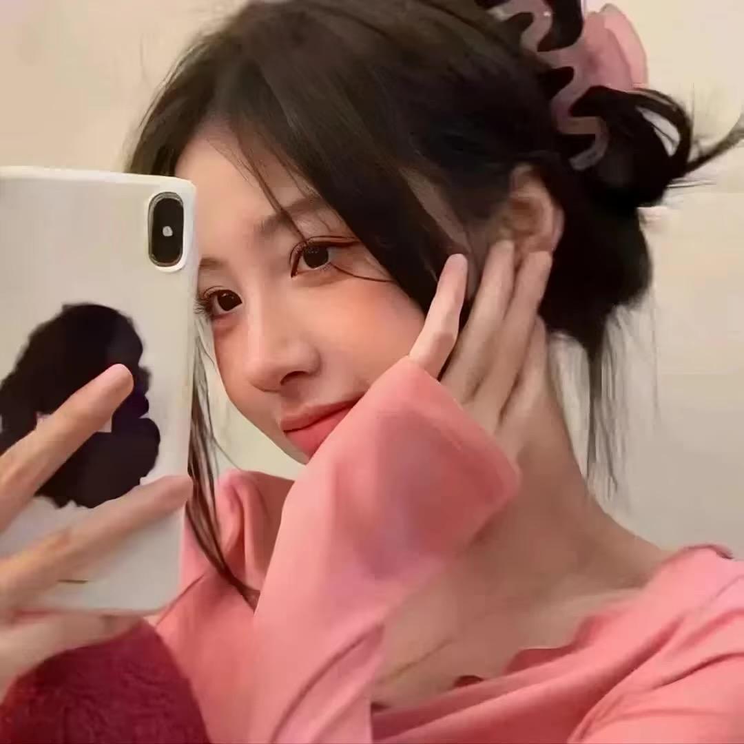 T.