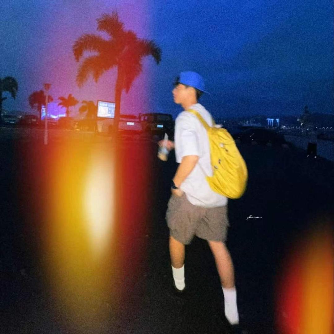 T.