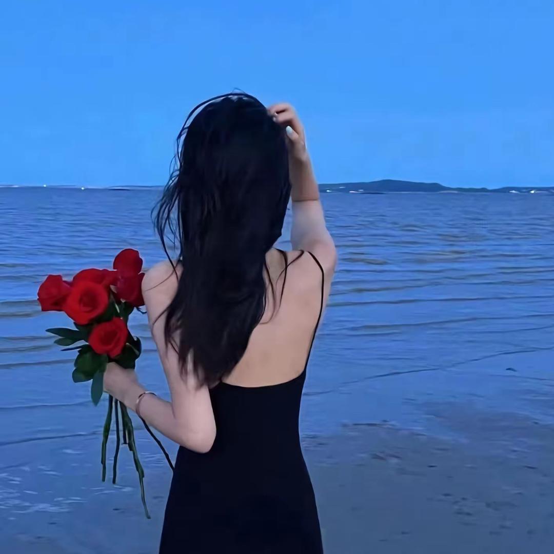 柒柒.