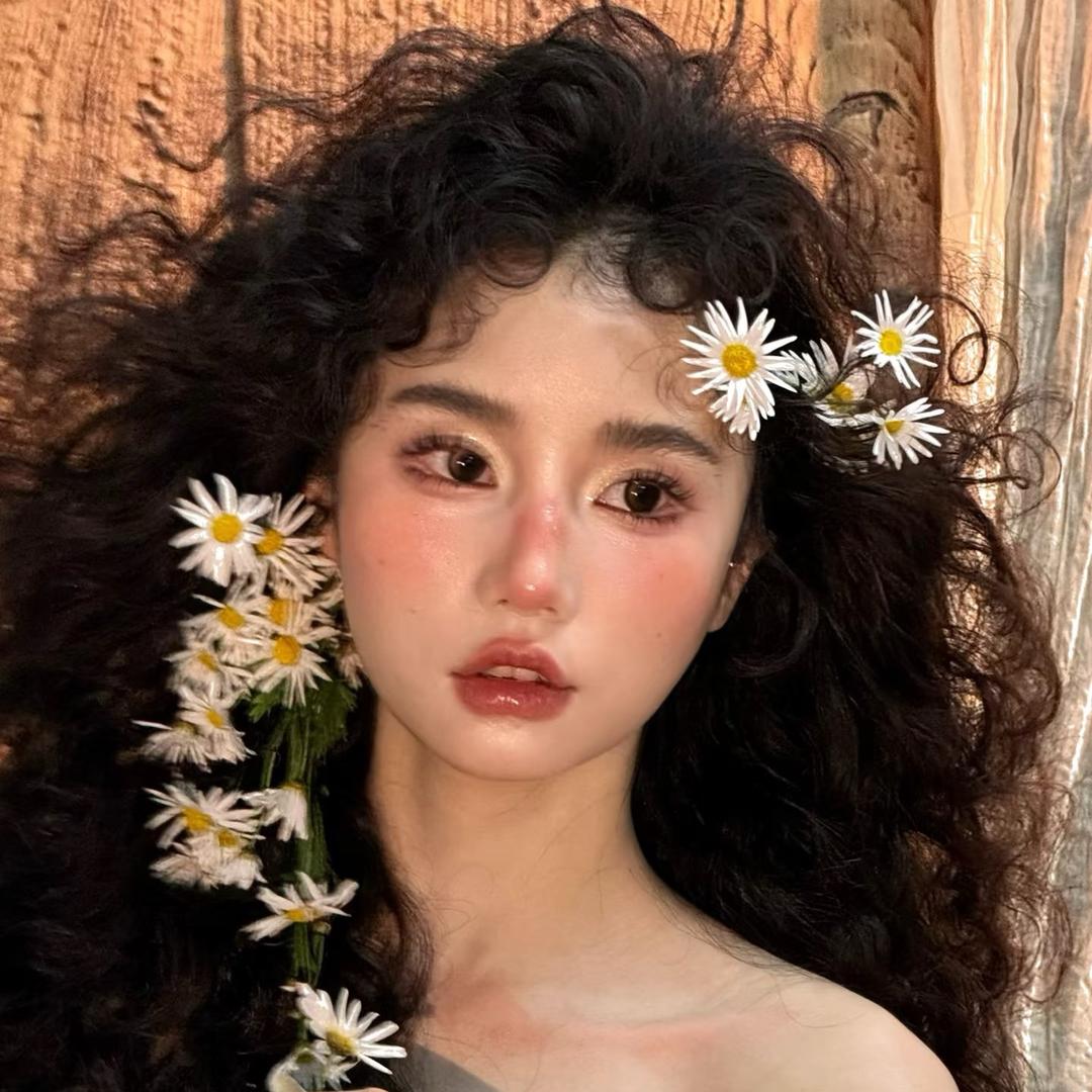 @张得美