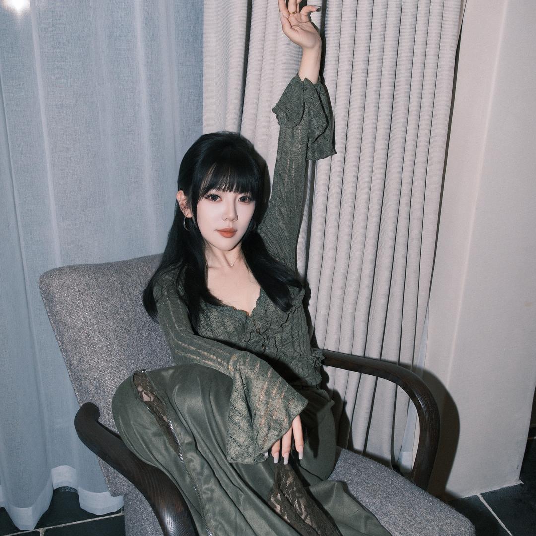 T.