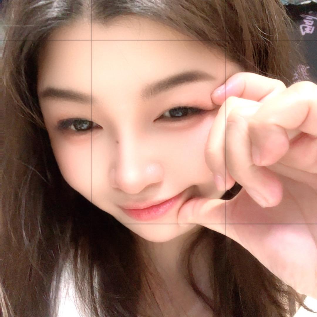 譚小希。